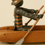 bonhomme sur la barque