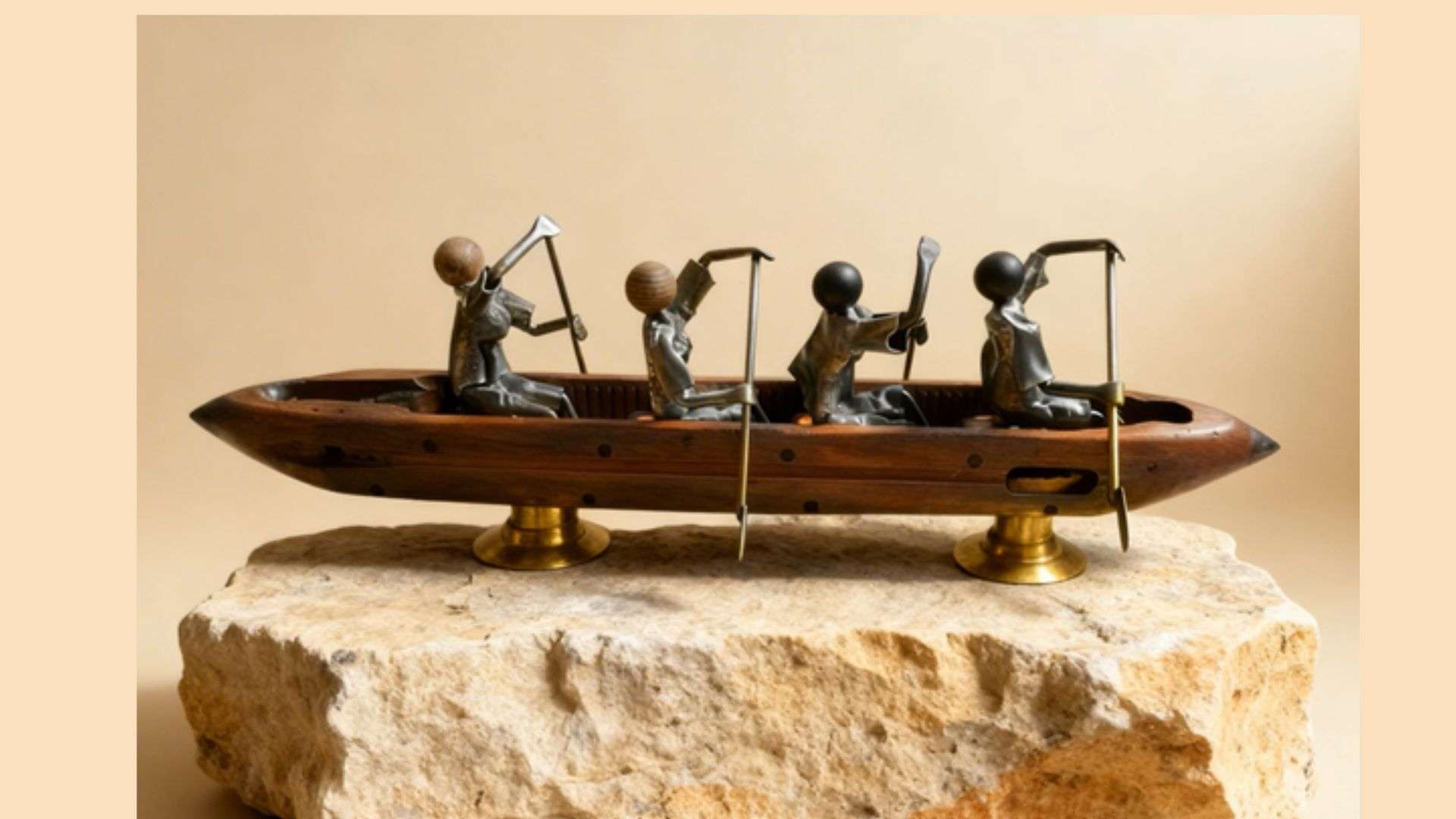 sculpture métal barque quatre rameurs