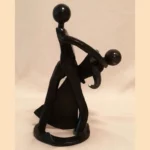 Sculpture couple de danseurs en métal recyclé en mouvement