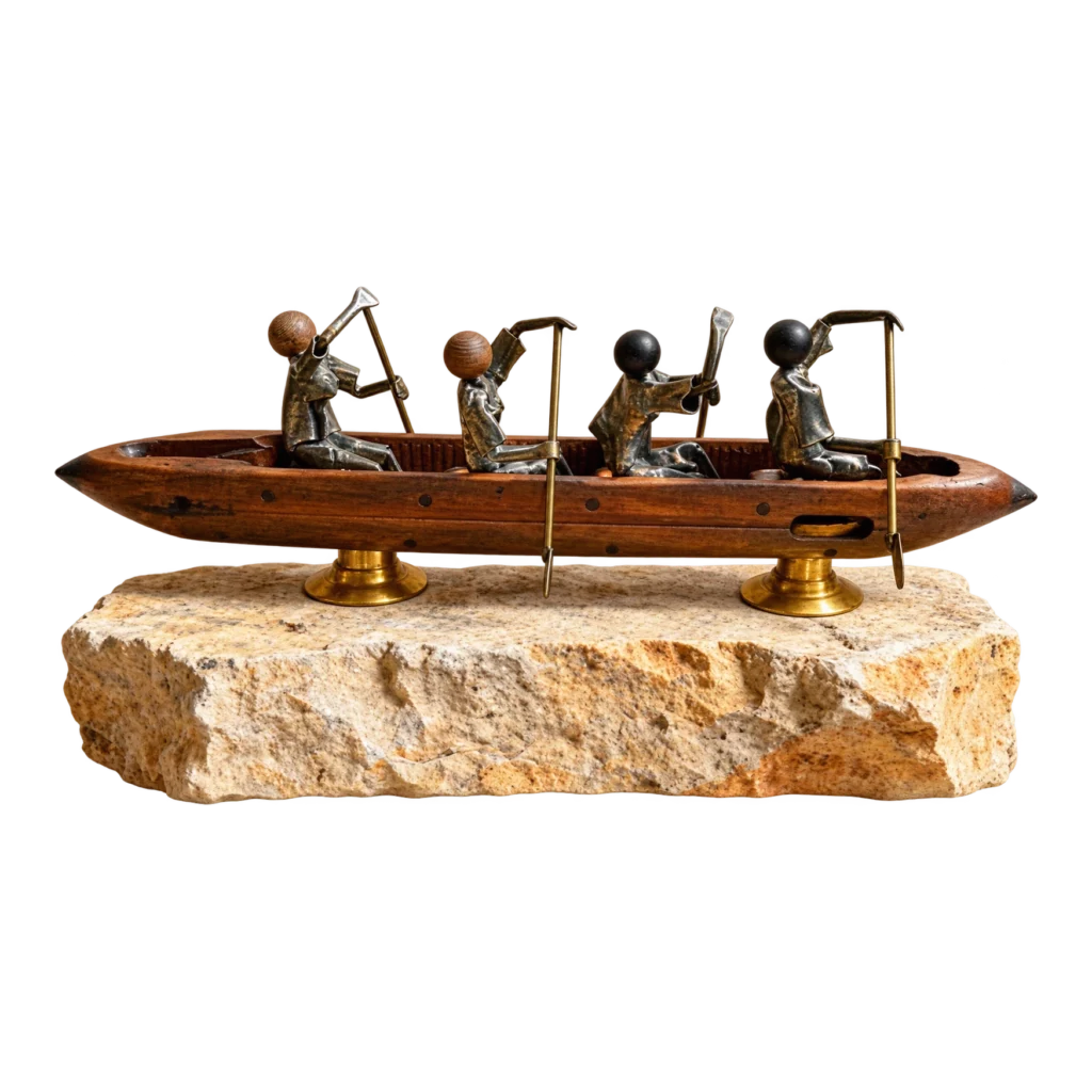 Sculpture en métal représentant une barque et ses quatre rameurs, œuvre de Bruno Cotton.